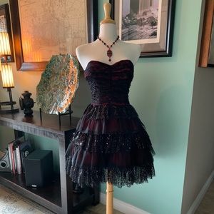 Masquerade black lace over red cocktail dress